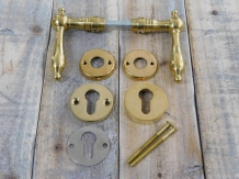 Set of door hardware - polished brass - including security rosette