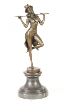 A bronze statue/sculpture of a theater dancer