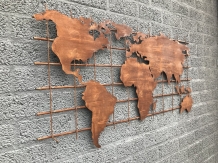 An iron wall rack with a world map on it, robust appearance